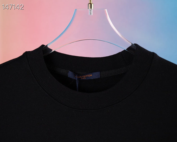 Back view of Louis Vuitton luxury clothing with tailored silhouette