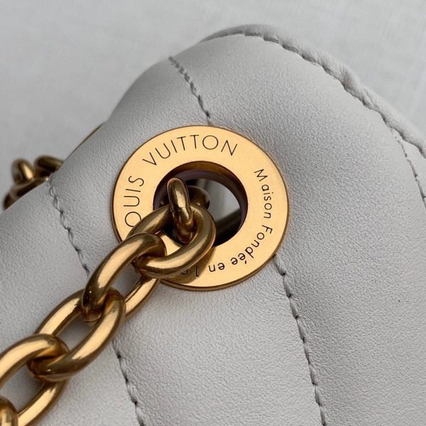 Back view of refined elevated women's handbag – women's luxury accessory