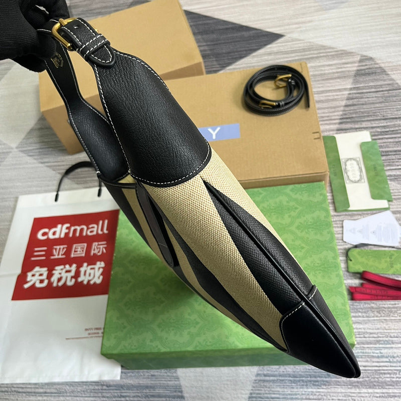 Side view of streamlined structured handbag