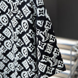 Full styled look of Louis Vuitton cotton t-shirt with monogram-inspired silhouette