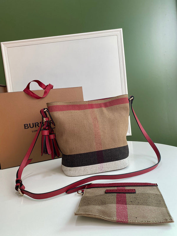 Ziva's Charm handbag – side angle view (one versatile size)