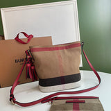 Ziva's Charm handbag – side angle view (one versatile size)