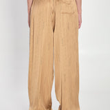 Close-up of Balenciaga pants hardware and fine stitching
