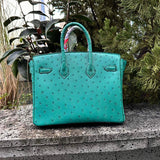 Side view of streamlined structured handbag