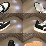 Side profile of Gucci fresh white-and-black sneakers signature lace-up style