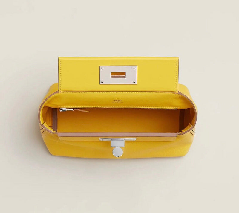 Side view of tailored structured handbag