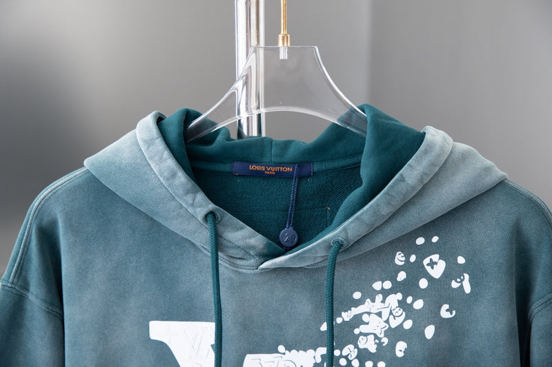 Close-up detail shot of Louis Vuitton luxury clothing with tailored silhouette