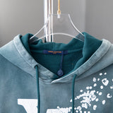 Close-up detail shot of Louis Vuitton luxury clothing with tailored silhouette