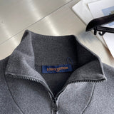 Flat lay presentation of Louis Vuitton luxury clothing with relaxed-fit cut