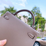 Side view of graceful structured handbag
