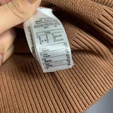Side profile of Lacoste luxury clothing with logo-detail design