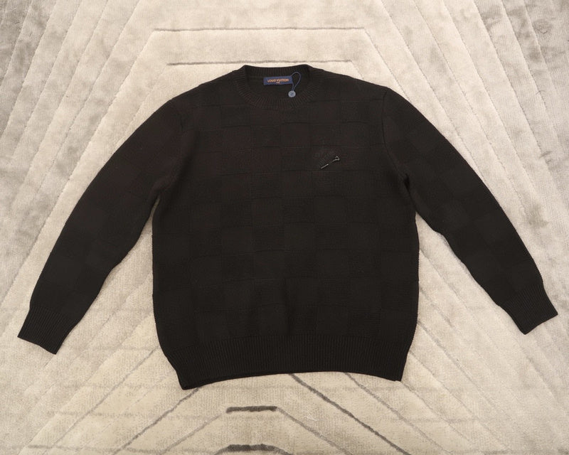 Side profile of Louis Vuitton luxury clothing with logo-detail design