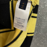 Close-up detail shot of Louis Vuitton luxury clothing with contemporary cut