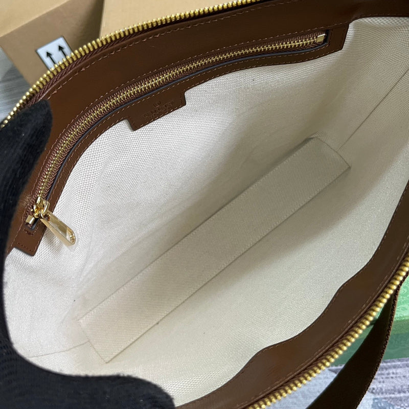 Side profile of elevated premium women's handbag – women's luxury accessory