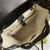 Side profile of sleek chic women's handbag – women's statement bag