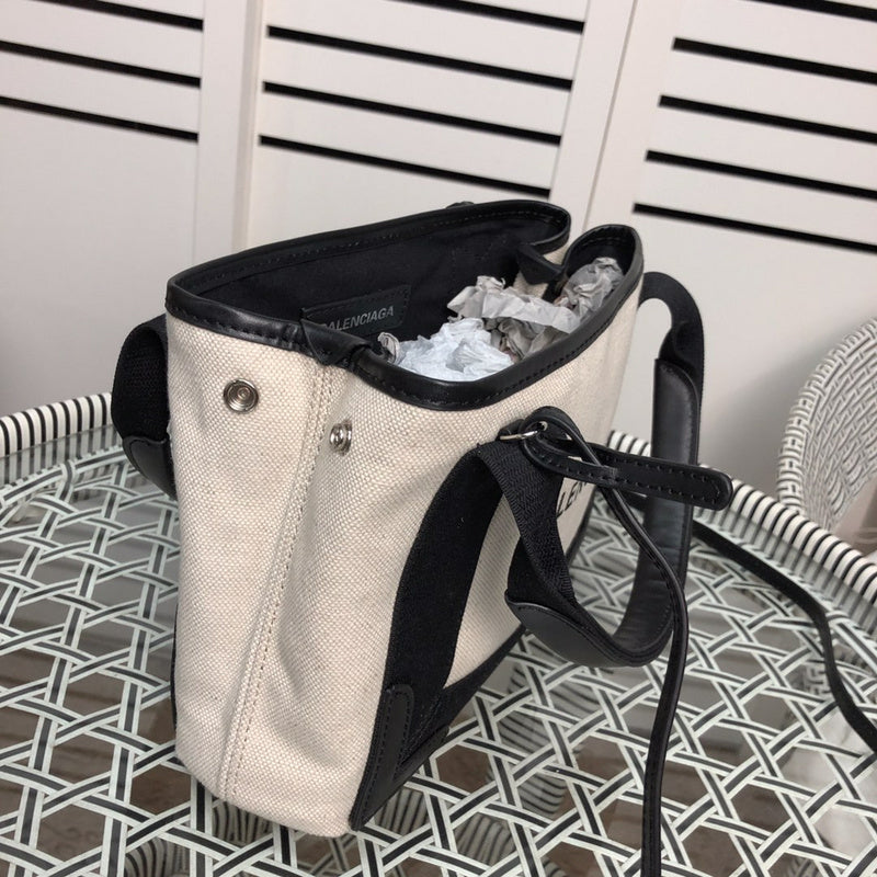 Styled lifestyle shot of structured everyday-luxe women's handbag – women's everyday handbag