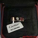 Side view of Cartier unisex jewelry piece