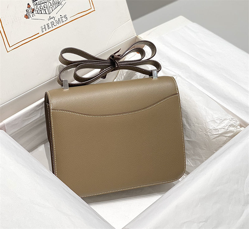 Side view of streamlined structured handbag