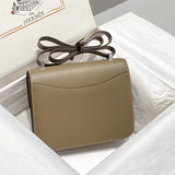 Side view of streamlined structured handbag