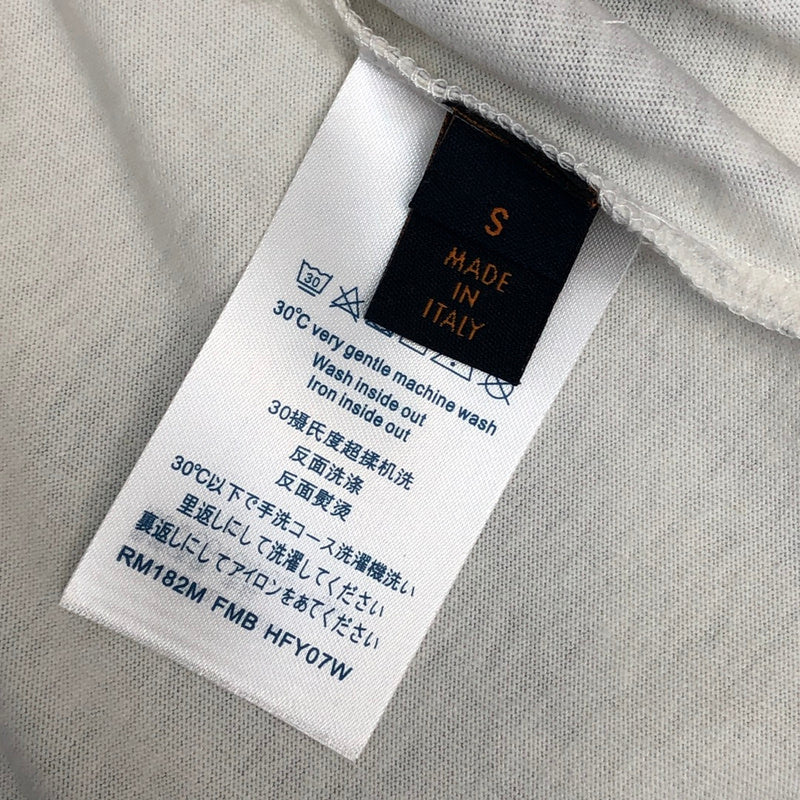 Flat lay presentation of Louis Vuitton cotton t-shirt with logo-detail design