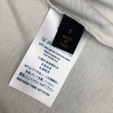 Flat lay presentation of Louis Vuitton cotton t-shirt with logo-detail design