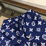 Close-up detail shot of Louis Vuitton cotton t-shirt with label-forward styling