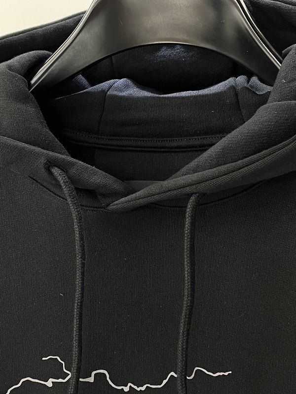Close-up detail shot of Givenchy luxury clothing with everyday silhouette