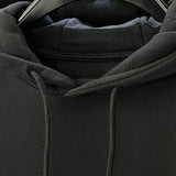 Close-up detail shot of Givenchy luxury clothing with everyday silhouette