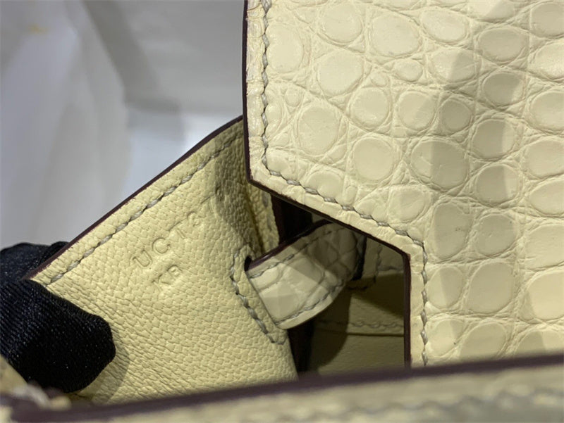 Side view of refined structured handbag