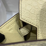 Side view of refined structured handbag