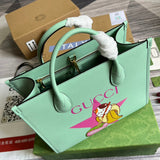 Side profile of statement polished women's handbag – women's statement bag