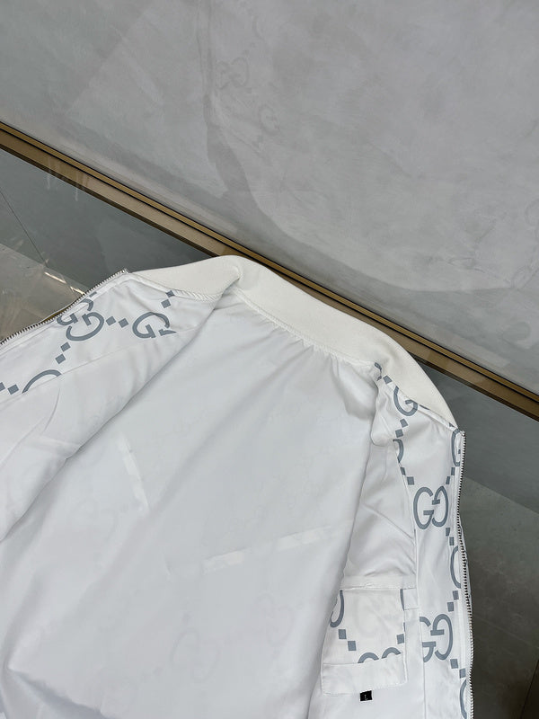 Flat lay presentation of Gucci luxury clothing with logo-detail design