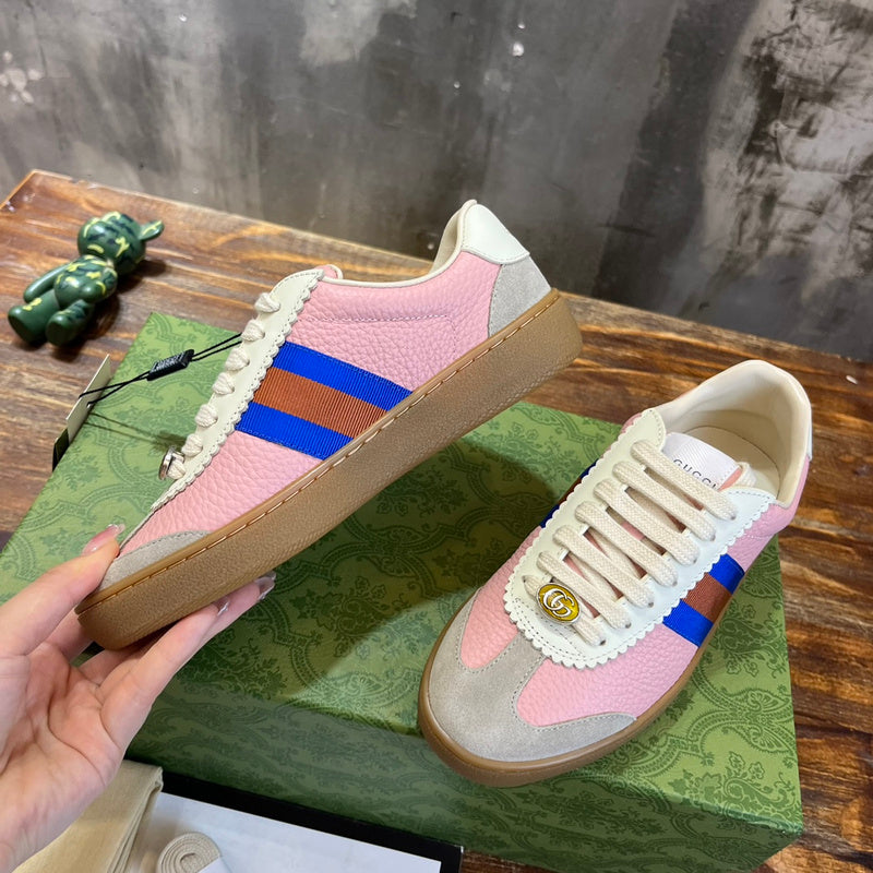 Side profile of Gucci classic monochrome sneakers low-top design