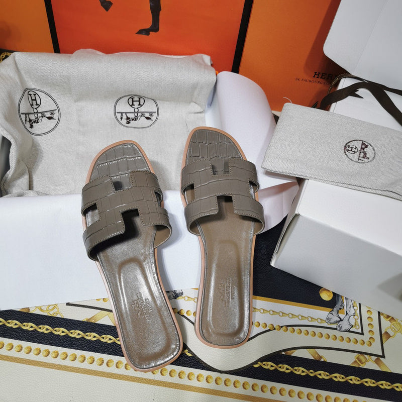 Hermès Nude Block Heel Sandals - Lifestyle Styling Shot