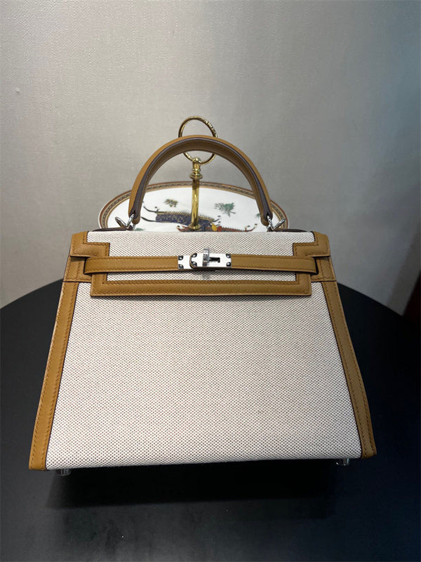  Signature crossbody bag carried on shoulder 22