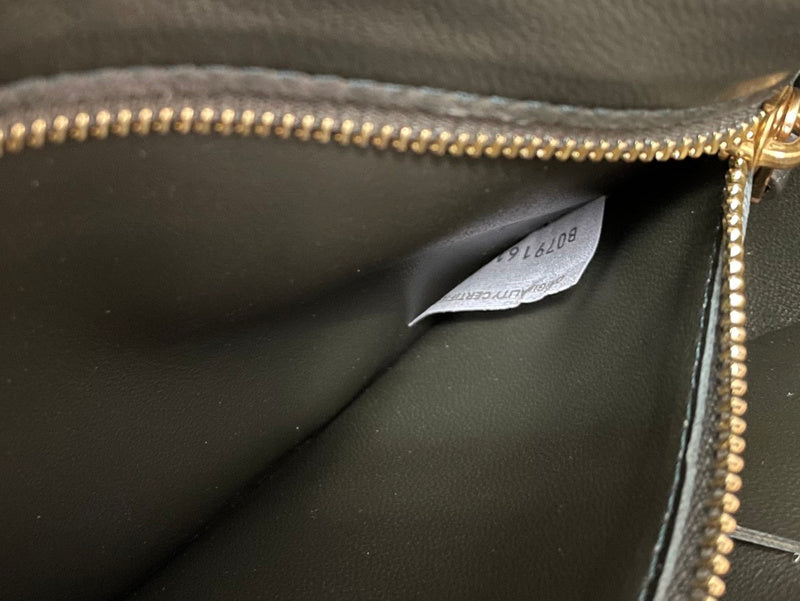Understated Vegan Leather Handbag - Chic Everyday Appeal | Women's Everyday Carry Handbag #1612 - side angle view (image 2) of designer-inspired handbag