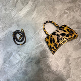Bold Premium PU Leather Handbag - Sleek Minimalist Lines | Women's Premium Handbag #867 - side angle view (image 2) of designer-inspired handbag