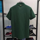 Close-up detail shot of Lacoste luxury clothing with signature branding