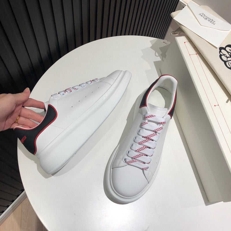 Alexander McQueen classic monochrome luxury sneakers view 4 heritage-inspired look