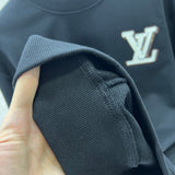 Back view of Louis Vuitton luxury clothing with logo-detail design