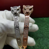 Side view of Cartier unisex jewelry piece