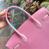 Side view of smart structured handbag