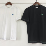 Front view of Lacoste luxury clothing with tailored silhouette