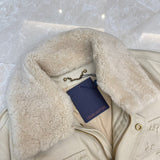 Flat lay presentation of Louis Vuitton luxury clothing with monogram-inspired silhouette