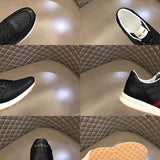 Side profile of Gucci muted earth tones sneakers retro runner design