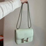  Tailored structured bag carried on shoulder