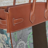  Signature handbag carried on shoulder 10