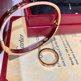 Angled view of Cartier unisex jewelry piece