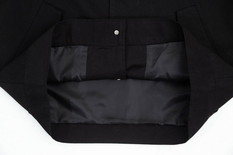 Front view of Louis Vuitton luxury clothing with monogram-inspired silhouette