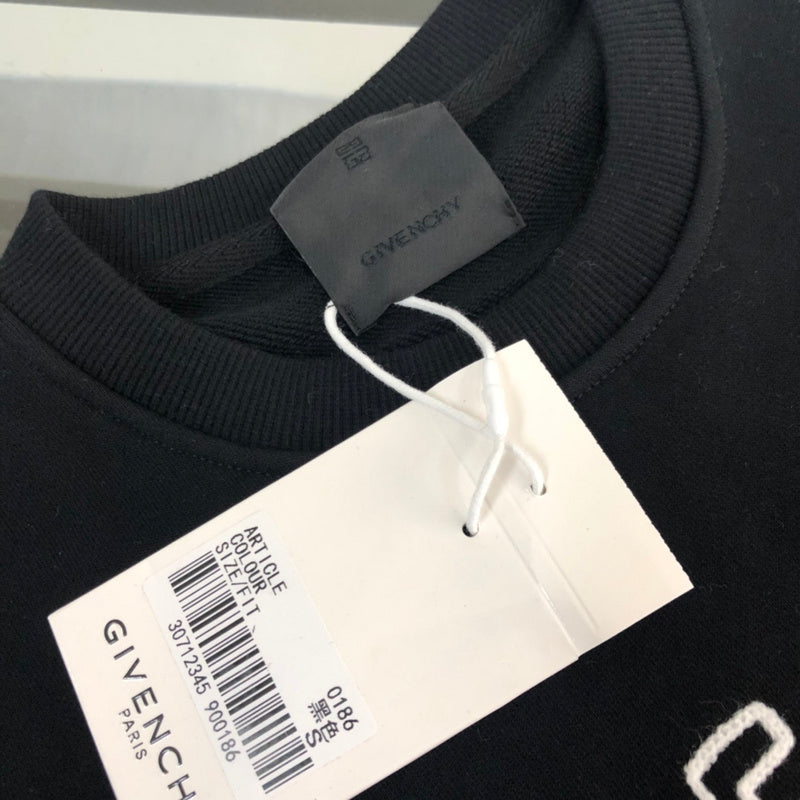 Full styled look of Givenchy luxury clothing with contemporary cut